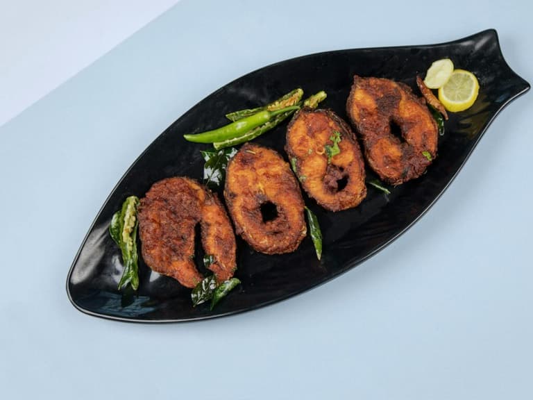 Навіщо поливати рибу газованою водою перед запіканням: секрет хрусткої скоринки